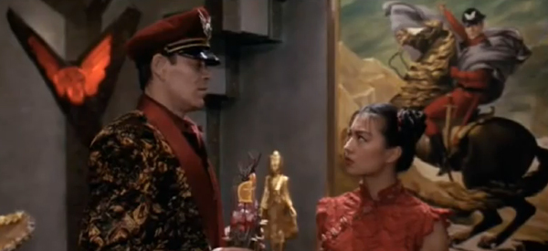 Only Raul Julia could wear a smoking jacket and a peaked cap without looking ridiculous.